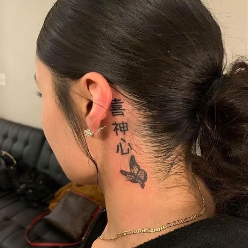 Tattoo chữ Trung Quốc ở cổ và hình con bướm